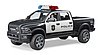 Pickup de police RAM 2500 avec policier