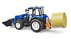 New Holland T5.120 con caricatore frontale, cassone di carico e forche