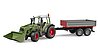 Fendt Vario 211 with frontloader and tipping trailer