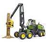 Abatteuse John Deere 1270G avec 1 tronc d'arbre