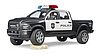 Pickup de police RAM 2500 avec policier