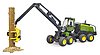 Abatteuse John Deere 1270G avec 1 tronc d'arbre