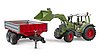 Fendt Vario 211 with frontloader and tipping trailer