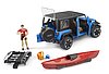 Jeep Wrangler Rubicon Unlimited with kayak and kayaker